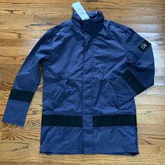 Nwt Men’s Small Navy Lightweight Calvin Klein Raincoat Jacket. Zip In Hood In Collar. Zips And Snaps In Front. Drawstring Inside To Create A More Custom Fit. Color Is Most Like Second Picture Functional Blue Outerwear For Work, Blue Functional Outerwear For Work, Navy Nylon Outerwear For Spring, Navy Functional Outerwear For Fall, Urban Style Blue Parka For Fall, Navy Nylon Spring Outerwear, Urban Blue Parka For Fall, Calvin Klein Outdoor Fall Outerwear, Blue Techwear Outerwear With Pockets