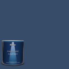 a can of marquee paint on a green background