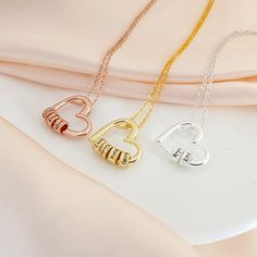 "Personalized Beads Heart Pendant Necklace,Engraved Beads Necklace,Custom Heart Name Necklace,Personalized Mothers Day Gift,Gift for Her ♡ PRODUCT  DETAILS * Material: 925 Sterling Silver / Copper * Color: Silver, Gold, Rose Gold * Chain length: 14\", 16\", 18\", 20\", 22\" * Pendant height:1.122 Inches * Pendant width: 1.122 Inches * Heart Charm: 20 x 20 mm * Personalisation: Custom Name, Beads ♡ OTHER  INFORMATION * All items are nicely packaged ready to gift in elegant jewelry boxes. * If you have some special design needs, welcome to contact us. * All of our jewelry is handmade with Love. ♡ PRODUCTION TIME * All our products are made to order so please allow us to take 7-12 business days to finish your jewelry before shipping out. ♡ CHANGES / CANCELLATIONS  * If you want to make change Heart Beads Charm Necklace For Valentine's Anniversary, Heart-shaped Letter Beads Jewelry For Mother's Day, Heart-shaped Letter Beads Jewelry For Gift, Heart-shaped Letter Beads Jewelry As Gift, Heart Shaped Letter Beads Jewelry For Valentine's Day, Mother's Day Heart Cut Charm Necklace With Heart Beads, Mother's Day Double Heart Necklace With Heart Beads, Heart-shaped Charm Necklaces With Heart Beads For Mother's Day, Heart Charm Necklaces For Mother's Day