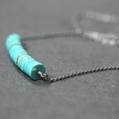 "Seventeen 8mm natural summer sky blue turquoise smooth rondelle disks with hints of green and warm copper glints securely wrapped with recycled fine silver, suspended from recycled sterling silver cable chain and oxidized for an organic, rustic look. The necklace drapes an elegant 18\" (or 20\") in length including the sterling silver lobster clasp. All jewelry comes suitably packaged for gift giving. Come see more of my shop: http://www.etsy.com/shop/TheSlyFox Everything you see here is made b Everyday Turquoise Jewelry With Spacer Beads, Turquoise Hand Wrapped Round Bead Necklaces, Everyday Minimalist Turquoise Necklace, Minimalist Turquoise Wire Wrapped Jewelry, Handmade Silver-colored Metal Turquoise Necklace, Nickel-free Turquoise Metal Necklace, Nickel-free Sterling Silver Turquoise Necklace Gift, Artisan Blue Turquoise Nickel-free Necklace, 14k Gold Wedding Ring