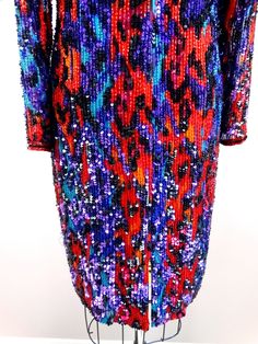 "This is an exquisite piece from Black Tie Oleg Cassini. It's embellished and hand beaded with bright sequins and beads. It's in perfect condition! Bust - 36\" Waist - 32\" Hips - 38\" Length - 37\" Size - US 8 This dress comes from a pet-free and smoke-free home. If you would like more info or have any questions, please don't hesitate to ask!" Multicolor Embellished Formal Dresses, Multicolor Embellished Dresses For Formal Occasions, Formal Multicolor Embellished Dresses, Multicolor Sequin Dress For Formal Occasions, Multicolor Sequin Dresses For Formal Events, Formal Multicolor Sequined Dresses, Red Long Sleeve Sequin Dress, Elegant Multicolor Embellished Sequin Dress, Elegant Multicolor Embellished Sequin Fabric