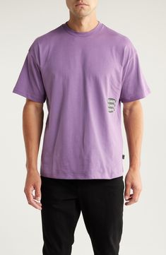 An oval-encased logo marks the back of this cotton-jersey T-shirt and appears stacked on the front. 29" length (size medium) Crewneck Short sleeves 100% cotton Machine wash, tumble dry Imported Basic Crew Neck T-shirt For Streetwear, Urban Purple Cotton T-shirt, Urban Style Purple Cotton T-shirt, Urban Purple Short Sleeve T-shirt, Purple Relaxed Fit T-shirt For Streetwear, Casual Purple T-shirt For Streetwear, Relaxed Fit Crew T-shirt With Screen Print, Screen Print Cotton Crew Neck Top, Relaxed Fit Crew Neck T-shirt With Screen Print