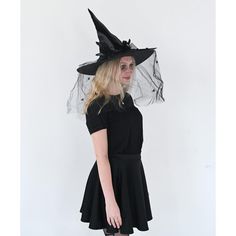 Skeleteen Classic Witch Headpiece is the ideal headwear for any woman dressing up as a cute witch Halloween. This beautiful witch hat can be worn for many style witches, a wicked one, a vintage one, a Victorian one, a creepy one, or a classy one. This hat is made of fancy black fabric, Satin-Feel and has cool decorations on the side that include a black bow with beads, a black veil with spiders hanging down, and some black feather accents. This big felt hat is made to fit most women's heads. Ske Black Witchy Wide Brim Costume Accessories, Goblincore Costume Accessories For Halloween Cosplay, Spooky Black Costume Hats And Headpieces For Halloween, Black Wide Brim Costume Hat For Cosplay, Wide Brim Costume Accessories For Halloween Party, Witchy Wide Brim Costume Hat For Party, Wide Brim Hats For Halloween Costume Party, Black Adjustable Witchy Costume Accessories, Adjustable Black Witchy Costume Accessories