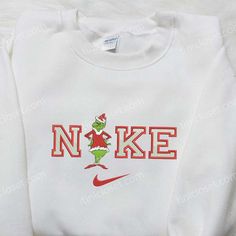 Introducing the Nike x Santa Claus Grinch Embroidered Shirt – the ultimate festive attire for the holiday season! Embrace the Nike Inspired, Embroidered Shirts, Best Valentine's Day Gifts, Husband Anniversary, Custom Nike, Christmas Gathering, Size Chart For Kids, Shirt Embroidery, Custom Nikes