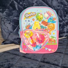 Mini Backpack Features The Popular Shop Ins Characters. Perfect For Storing All Your Essentials Including Your Shop Ins Toys. Size Is 10.5 Inches Long Brand New Never Used With Tags Attached. Pink Playful Backpack With Cute Design, Playful Pink Backpack With Cute Design, Pink Backpack For Playtime, Pink Standard Backpack For Playtime, Playful Pink Backpack For Back To School, Pink Backpack For Daycare And Back To School, Cute Pink Backpack For School Events, Pink Fun Backpack For Back To School, Fun Pink Backpack For Back To School