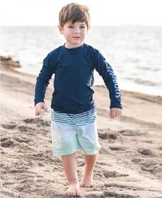 Classic and cute navy gingham makes these swim trunks a must-have for your little guy's vacation wardrobe. Whether he's at the pool, beach or lake, he'll look so adorable in this customer favorite swimsuit. Pair with a long-sleeve logo rash guard for a complete sun-safe outfit. 100% Polyester Hand wash cold; lay flat to dry Imported / Designed in the USA Made with UPF 50+ sun protected fabric. We recommend applying sunscreen for added protection. Inner mesh lining for ultimate comfort; functiona Steve Hanks, Applying Sunscreen, Beach Fit, Benjamin Bunny, Navy Gingham, Vacation Wardrobe, Swimming Outfit, Summer Swim, Babies First Year