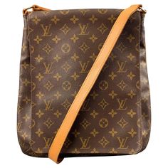 LOUIS VUITTON GM MUSETTE SALSA bag comes in a brown and beige monogram coated canvas featuring a messenger style, adjustable crossbody strap, gold tone hardware, and inner pocket. Made in France. Very Good Pre-Owned Condition. Lights signs of wear. Marked: AS 0070 Measurements: Length: 12.5 inches Width: 1 inches Height: 14.5 inches Drop: 41 inches Reference: 125366 Category: Handbag & Leather Goods More Details Brand: LOUIS VUITTON Color: Brown Color 2: Beige Pattern: Monogram Material: Coated Lights Signs, Louis Vuitton Gm, Sac Louis Vuitton, Beige Pattern, Louis Vuitton Brown, Handbag Leather, Lighted Signs, Brown Beige, Leather Goods