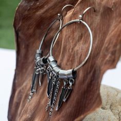 "Handmade oxidized sterling silver earrings  2.75\"(70mm) in length including ear wire and 1.18\"(30mm) in width. Each earring weighs approx 6 gr, total weight(pair) approx 12 gr. Very comfortable for all-day use!! The earrings have been oxidized with black oxidation to highlight the details. Each jewelry is totally hand-made, finished, and made to order. Allow for about 2-3 Days for the jewelry to be made. It comes gift wrapped and ready for giving! Back to the SHOP: https://www.etsy.com/shop/H Gunmetal Jewelry, Silver Braided Ring, Oxidized Silver Bracelet, Sterling Silver Chain Necklace, Silver Chain Bracelet, Sterling Silver Hoop Earrings, Beaded Hoop Earrings, Beaded Hoops, Seed Bead Earrings