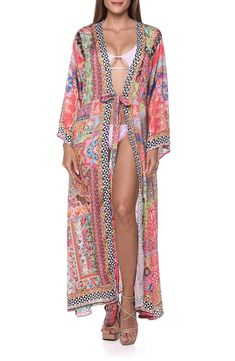 Go from beach to boardwalk in this sun-ready cover-up duster that's secured with a front tie and rendered in a bright print. Shawl collar Long sleeves Integrated waist tie
 100% polyester Hand wash, dry flat Imported Bohemian Multicolor Printed Cover-up, Spring Multicolor Swimwear For Beach Cover-up, Orange Open Front Kimono For The Beach, Spring Multicolor Printed Beach Dress, Summer Patterned Kimono For Beach Cover-up, Multicolor Boho Print Beach Dress For Vacation, Long Beach Cover-up Swimwear For Spring, Long Spring Beach Cover-up Swimwear, Spring Multicolor Printed Swimwear