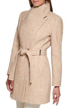 Keep out the cold in this stylish coat framed with a wing collar and defined with a waist tie belt. Wing collar Toggle cuffs Removable tie belt Lined Nickel and camel are 64% polyester, 18% acrylic, 18% rayon; black and white is 51% wool, 45% polyester, 2% nylon, 2% rayon; oatmeal twill is 58% wool, 31% polyester, 6% acrylic, 4% nylon, 1% rayon; black herringbone is 66% polyester, 20% acrylic, 14% rayon Dry clean Imported Model stats: 5'10" height, 32" bust, 25" waist, 36" hip. Model is wearing Fitted Beige Wool Coat For Fall, Fitted Long Beige Sweater Coat, Fitted Long Beige Outerwear, Beige Fitted Long Outerwear, Elegant Sweater Coat For Cold Spring Weather, Fitted Sweater Coat For Cold Weather, Belted Long Sleeve Sweater Coat, Belted Long Sleeve Sweater Coat For Fall, Chic Fitted Winter Sweater Coat