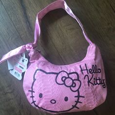 Super Cute Nwt Hello Kitty Small Pink Silky Hobo Handbag, Snake Print On Front, One Handle, Top Zip Closure, Hk On Front, Plenty Of Room For A Phone, Mirror, Lipstick, Kleenex, Compact, Hand Sanitizer, Keys, And A Small Wallet! Measures-9l X 5h X 1.5d Will Ship Next Business Day! I Am Not A Slow Shipper. Price Firm Thank You For Looking! No Trades. Happy To Answer Questions. Cheap Playful Hello Kitty Print Bags, Cheap Black Hello Kitty Print Bags, Pink Hello Kitty Rectangular Bag, Black Hello Kitty Print Travel Bag, Pink Hello Kitty Print Shoulder Bag, Hobo Handbags, Small Wallet, Snake Print, Pretty Outfits