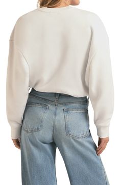 Here's the slightly slouchy sweatshirt that's the favorite to win at weekends. 27" length (size Medium) Crewneck Long sleeves 75% cotton, 25% polyester Machine wash, tumble dry Imported Casual Crew Cropped Sweater, Comfy French Terry Tops For Fall, Oversized Cropped Sweater With Crew Neck, Trendy French Terry Tops With Ribbed Cuffs, Trendy Soft-washed French Terry Tops, Relaxed Fit Crew Cropped Sweater, Oversized Crew Neck Casual Cropped Sweater, Trendy Sweatshirt With Ribbed Collar For Everyday, Oversized Casual Crew Neck Cropped Sweater