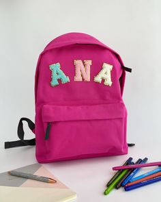 Personalised Backpack Customisable Backpack Letter Backpack Back to school kindergarten backpack Junior gift children Introducing our delightful collection of backpacks, specially designed for young adventurers and ideal for kindergarten and young children. Crafted with utmost care and attention to detail, these backpacks offer the perfect blend of comfort, safety, and style to make every day a joyful exploration. Padded adjustable shoulder straps. Zippered front pocket. Padded back panel. Grab Cute Standard Backpack For School Events, Pink Backpack For Daycare And Back To School, Back To School Backpack With Letter Print For Students, Softback Bags For Back To School, Back To School Softback Bags For School Events, Pink Backpack For Back To School, Personalized Pink Backpack For Back To School, Pink Backpack For End Of School Year Gift, Pink Backpack For End Of School Year Events