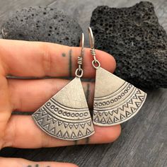 Simple yet beautiful silver triangular earrings, with small hand stamped details. Perfect earrings for any occasion, easy to match to any outfit. This are flat and light weight what makes them easy to wear. A pair to wear and never take off. They are 3.4cm- 1.45inch long 3.3cm- 1.30inch wide. They have a drop length of 5cm- 2 inch A unique addition to your jewelry collection. To see more unique silver earrings, click the link below https://www.etsy.com/shop/AkashiJewelry?ref=seller-platform-mcna Nickel-free Triangle Earrings As Gift, Nickel Free Triangle Metal Earrings, Nickel-free Metal Triangle Earrings, Nickel-free Triangle Bohemian Jewelry, Bohemian Stamped Earrings, Nickel-free Bohemian Triangle Jewelry, Bohemian Triangle Nickel-free Jewelry, Handmade Triangle Earrings For Festival, Sterling Silver Triangle Earrings For Pierced Ears