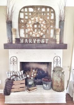 a living room filled with furniture and a fire place in front of a mantle covered in plants