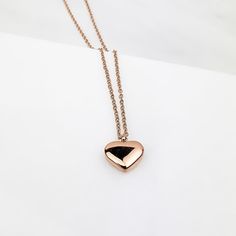 Charming with its lovely simplistic design, the My Full Heart Necklace will definitely bring smiles and create memories. What a great necklace to express love and admiration for the one that makes your heart beat special. Material: 18k Gold/18k Rose Gold plating over Stainless Steel Necklace length: 16 inches Pendant Shape: heart Nickel & Lead-free & Hypoallergenic Complimentary Gift Box Included Dainty Rose Gold Heart Locket Necklace, Rose Gold Heart Charm Necklace For Keepsake, Rose Gold Heart Charm Necklace As Keepsake, Rose Gold Heart Pendant Locket Necklaces, Rose Gold Heart Pendant Necklace Gift, Anniversary Rose Gold Stainless Steel Charm Necklace, Rose Gold Heart Charm Necklace In Stainless Steel, Rose Gold Heart Pendant Charm Necklace, Rose Gold Open Heart Locket Necklace