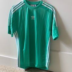 Teal Adidas Originals Jersey Type Shirt. Size Small. Never Worn. Great Condition. Nwot Sporty Green Summer Shirt, Adidas Three Stripes Summer Tops, Adidas Summer Tops With Three Stripes, Green Casual T-shirt With Three Stripes, Casual Green T-shirt With Three Stripes, Green Crew Neck Top With Three Stripes, Green Casual Top With Three Stripes, Casual Green Top With Three Stripes, Green Streetwear Tops With Three Stripes