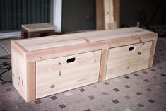 two wooden boxes sitting on the floor next to each other