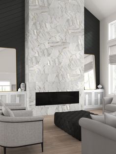 a living room filled with furniture and a fire place in front of a stone wall