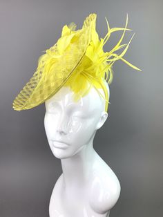 This beautiful couture fascinator full of detail, adorned with feathers and attaches matching satin headband. Perfect Piece for a wedding, the races, tea party or any other special occasion. -Light and comfortable to wear Matching mini Mommy & Me pieces available for toddlers and young girls! See them here: https://www.etsy.com/shop/QueenSugarBee?ref=seller-platform-mcnav&section_id=21350065 Don't forget matching gloves to complete the look! You can find them here! https://www.etsy.com/s High-end Yellow Mini Hat For Kentucky Derby, Gatsby Style Party Headband Hat, Gatsby Style Costume Hat For Kentucky Derby Party, Kentucky Derby Gatsby Style Party Hat, Ostrich Feather Fascinator For Royal Ascot Races, Feather Trim Mini Hats For Kentucky Derby Evening, Evening Feather Hat Headpiece, Feathered Top Hat For Kentucky Derby Races, Evening Feathered Hat Headpiece