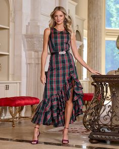 Turn heads this season in our High Neck Plaid Ruffle Gown. Crafted from festive taffeta in classic tartan plaid, the elegant silhouette is trimmed with a cascading ruffle design and a grosgrain waist belt for statement-making special occasion style. Plaid Evening Gown, Plaid Wedding Dress, Tartan Wedding Dress, Winter Holiday Dress, 2024 Wishes, Period Dresses, Gothic Dark Academia, 2025 Christmas, Boston Proper Dresses