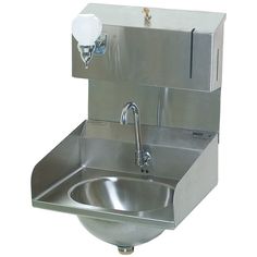 a stainless steel bathroom sink with soap dispenser