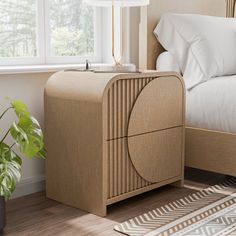 a bed room with a neatly made bed and a night stand next to a window