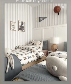 there is a bedroom with striped walls and blue bedspreads, while a basketball hangs on the wall