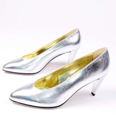 For Sale on 1stDibs - This is such a fun pair of Walter Steiger shoes in a fabulous metallic silver. Perfect for the holidays, these silver gently pointed toe heels have leather Silver Closed Toe Kitten Heels For Formal Occasions, Metallic Silver Heels With 4-inch Heel For Formal Occasions, Silver Court Shoes With 4-inch Heel For Evening, Silver Formal Court Shoes With Padded Heel, Silver Low Heel Heels With Leather Sole, Formal Silver Almond Toe Kitten Heels, Formal Silver Court Shoes With Padded Heel, Silver Almond Toe Heels With Sculpted Heel, Silver Court Shoes With Low Heel For Evening