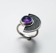 sterling silver w/ patina and amethyst amethyst- 8mm ring size- 8.75 Silver Sterling Amethyst Ring With Round Stone, Hand Forged Round Amethyst Jewelry, Purple Amethyst Open Ring In Sterling Silver, Unique Silver Amethyst Ring, Modern Sterling Silver Round Amethyst Ring, Modern Purple Sterling Silver Ring, Sterling Silver Amethyst Ring, Moon Ring, Half Moon