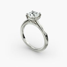 a diamond engagement ring on a white background