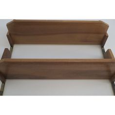 two wooden shelfs sitting on top of each other