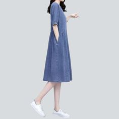 Feel the nostalgia of the '90s with our 2023 Spring-Summer Collection elegant half-sleeve denim dress! Be the trendsetter you're meant to be and embrace the trend renaissance with this stylish and durable piece that will have you radiating confidence and style.Why You'll Love It: 90s Style: Get that vintage-inspired look and make a statement with a classic design. Monochrome: With a sleek. slim fit. this traditional design will never go out of style. Long: With a pull-on closure. this dress is p Casual Short Sleeve Beach Dress For Spring, Casual Short Sleeve Dress With Relaxed Fit For Summer, Casual Short Sleeve Summer Dress With Relaxed Fit, Denim Blue Short Sleeve Dresses With Pockets, Casual Cotton Short Sleeve Dress For Spring, Denim Midi Dress With Pockets And Short Sleeves, Short Sleeve Denim Blue Midi Dress, Denim Blue Short Sleeve Cotton Midi Dress, Denim Blue Short Sleeve Midi Dress