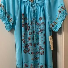 Very Soft 100% Rayon. Turquoise In Color. Very Pretty Blue Bohemian Peasant Top In Relaxed Fit, Blue Bohemian Peasant Top With Relaxed Fit, Beach Peasant Tunic Top, Casual Turquoise Beach Blouse, Blue Flowy Peasant Top For Spring, Blue Bohemian Relaxed Fit Blouse, Casual Turquoise Cotton Blouse, Casual Cotton Peasant Dress, Blue Flowy Bohemian Peasant Top