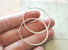 Sterling silver hoop earrings, easy everyday wear.    Hammered hoops out 18 guage, sterling silver filled wire - a staple for any wardrobe. Shiny and organic, each one a little unique from the other since theyve been formed by hand.    Measures just under 1 1/2 in diameter. Earring Inspiration, Earrings Inspiration, Sterling Silver Hoop Earrings, Sterling Silver Hoops, Earrings Sterling Silver, Silver Hoops, Silver Hoop Earrings, Sterling Earrings, Sterling Silver Earrings