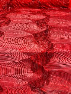 an abstract red background with wavy lines