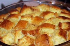 a casserole dish filled with bread on top of a stove burner and ready to be eaten