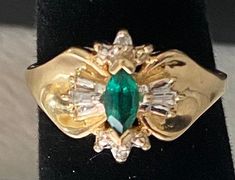 Beautiful 10K Yellow Gold Emerald Diamond Ring Ring is size 6.25 Beautifully crafted in 10K yellow gold. The center is a .15ct marquise emerald cut emerald with small round genuine diamonds and diamond baguettes! Ring is stunning, diamonds and emeralds sparkle beautifully! Weighs 2.5 grams. Shipped insured in a gift box I guarantee item to be exactly as described and pictured. Gold Marquise Cut Diamond Ring For May Birthstone, Marquise Emerald Ring For Formal Occasions In May, Heirloom Gold Marquise Cut Emerald Ring, Classic Gold Marquise Emerald Ring, Heirloom Marquise Cut Gold Emerald Ring, Classic Marquise Emerald Ring In Gold, 14k Gold Marquise Cut Emerald Ring, Gold Marquise Emerald Ring, Marquise Emerald Ring In Gold