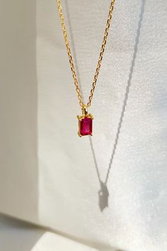 Make a statement with our Ruby Birthstone Necklace, the perfect accessory for any outfit. The ruby gemstone adds a pop of color and sophistication to any look, while the delicate 14k gold-filled chain gives it a touch of elegance. Gift it to your loved ones born in July or to anyone who appreciates a stunning piece of jewelry! 💎 #gemstonejewelry #giftsforher #rubynecklace #goldjewelry #birthdaygift #spring2023 #summerfashion #birthstonejewelry Dainty Red Jewelry For Everyday, Red Necklace With Adjustable Chain For Everyday, Minimalist Red Necklace For Her, Minimalist Red Necklace As Gift For Her, Red 14k Gold Birthstone Necklace, Dainty Red 14k Gold Necklace, Minimalist Red Gemstone Birthstone Necklace, Dainty Ruby Gemstone Necklace, Red Tarnish Resistant Necklace As Gift