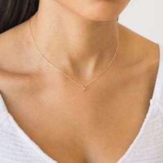 Tiny, dainty, and adorable, this Tiny Initial Necklace will be your new go-to. It's personalized just for you - wear your own initial or that of a special someone in your life. You can wear it everywhere - from your morning coffee run all the way to girl's night out. Yes - that includes the gym and the shower too! DETAILS Necklace length: 16" with 2" extender 14k gold vermeil -or- sterling silver charm - 5mm tall 14k gold filled -or- sterling silver chain, findings, & spring clasp Safe for sensi Tiny Initial Necklace, Dainty Letter Necklace, Dainty Initial Necklace Gold, Necklace From Boyfriend, Gold Dainty Necklace, K Necklace, Letter Charm Necklace, M Necklace, Dainty Initial Necklace