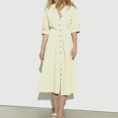 Round Collar Dress With V-Neck Front And Turned-Up Short Sleeves With Buttoned Tabs. Darts At Waist. Front Pockets. A-Line Silhouette. Front Button Closure. 100% Cotton Machine Wash Max. 30c/86f Delicate Cycle Do Not Use Bleach / Whitener Iron Maximum 110c/230f Tetrachloroethylene Dry Clean Low Temperature Dryer May Be Used Wash Separately Casual Neutral V-neck Maxi Dress, Classic V-neck Midi Dress For Summer, Summer Khaki V-neck Midi Dress, Elegant Beige Button-up Midi Dress, Zara V-neck Shirt Dress For Work, Khaki Midi Dress For Spring Daywear, Daytime Midi Length Summer Shirt Dress, Khaki Collared Dress For Daywear, Elegant Khaki V-neck Dress