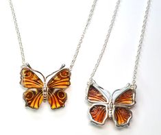 Natural Baltic Amber Peacock Butterfly 925 Sterling Silver Intaglio Necklace, the Butterfly is carved from back by an Amber Artist in Poland and measures 24X27mm, the necklace is 18" with a 2" extender. Listing is for one Necklace. Arrives to your home with the "All About Amber" Brochure which includes care instructions! Thank you for looking! Elegant Carved Orange Jewelry, Elegant Orange Carved Jewelry, Carved Orange Jewelry For Gifts, Carved Orange Jewelry For Gift, Silver Intaglio Round Pendant Necklace, Silver Necklace With Intaglio Round Pendant, Sterling Silver Brown Necklace For Gift, Brown Hallmarked Jewelry As Gift, Brown Hallmarked Jewelry Gift