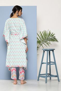 Experience the perfect combination of style and comfort with our exclusive Printed Fancy Fabric Kurti Bottom Set. This set features a beautifully crafted kurti, adorned with an eye-catching print, in a vibrant color that is sure to turn heads. The intricate detailing on this piece speaks for itself, making it perfect for any occasion. Along with the kurti, we’ve also included a matching bottom set which adds to the overall elegance of this outfit. The fabric used is both lightweight and comforta Long Choli Lehenga, Angrakha Style, Fancy Fabric, Sea Green Color, Lehenga Wedding, Printed Kurti, Net Fabric, Leisure Activities, Georgette Fabric