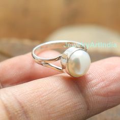 Pearl Ring, Natural Gemstone Ring, Handmade Band Ring, 925 Sterling Silver Ring, Gift For Her, Love Ring, Birthstone Ring, Anniversary Ring About Product:- Gross weight: 3.50 grams according ring size Ring Height & Width: 7x7 mm approx. Band Thickness: 3mm Approx. Gemstone Used: Pearl Metal Used: Solid 925 Sterling Silver Stamp Mark: 925 Metal Color: Shiny Silver Listing is For One (1) Piece Ring. These items are handmade. Jewelry Related: 925 Silver Ring, Middle Finger Ring, Sterling Silver Sterling Silver Pearl Ring With Birthstone For Gift, Classic Sterling Silver Pearl Ring With Gemstone, Silver Pearl Ring With Polished Finish For Gift, White Sterling Silver Pearl Ring With Polished Finish, Hallmarked Sterling Silver Pearl Ring For Gift, Fresh Water Pearl Ring, Middle Finger Ring, September Birthstone Rings, June Birthstone Ring