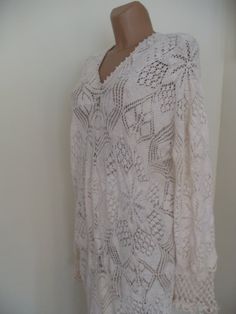 Dress robe   Delicate yvori lace dress, handknit.Wedding dress,Plus crochet knit clothing.Bridal gress Woven from 100% cotton. Washable at 30 degrees, not deformed during drying. Can be worn without lining on hot days Suitable for the beach. bust 90-120 cm hip 90 -130 cm length 145 cm size   38-48EU  size  10-18 USA Another size only on order Please pay only by peypal Elegant V-neck Crochet Dress, White Pointelle Knit V-neck Crochet Top, Elegant Lace Crochet Dress With Open Knit, Elegant Open Knit Lace Crochet Dress, Elegant White Crochet Knit Top, White Crochet V-neck Dress With Open Knit, White V-neck Open Knit Crochet Dress, Elegant White V-neck Crochet Top, Long Sleeve Crochet Lace Dress