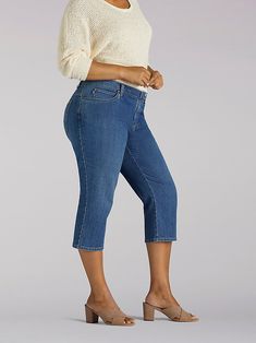 The Relaxed Fit Capri is your ultimate go-to jean when the weather gets warmer. The top sits just below the natural waist (mid rise) and has a little extra wiggle room in the seat and thigh for all-day comfort. True indigo wash options keep this jean a timeless classic while the crop lets you show a little leg. Slip these on with your favorite top and a cute pair of wedges, the next step is yours. Womens Capris, Next Step, The Next Step, Cropped Style, Vintage Shorts, New Wardrobe, Vintage Jeans, Timeless Classic, Casual Pants