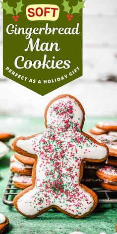 gingerbread man cookies with sprinkles on a cooling rack and green background