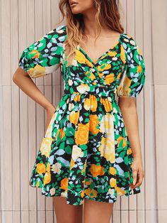 Introducing our Ellerie Floral Wrap Mini Dress, featuring a playful back cut-out, complete with a tie bow for added flair. This dress is perfect for adding some quirk and fun to your wardrobe. Say goodbye to boring, hello to Sienna! Size Guide: Model is 5’6” tall, and has a 33.2” bust, 26.4” waist, & 35.2” hips. She is wearing a S / US 4 / AU 8. This dress is true to size. Material: 100% Polyester Feature: V-neckline. Short Puff Sleeves. Wrap dress. Back Cut-out with tie bow. Floral print. Mini Short Beach Dresses, Printed Beach Dresses, Pyjama Satin, Short Dress Styles, Y2k Summer, Lantern Sleeve Dress, Purple Design, Autumn 2024, Beach Skirt