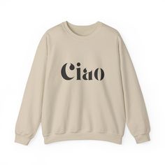 Stay warm and stylish with the Ciao Sweatshirt! The ribbed collar and medium-heavy fabric blend of cotton and polyester provide ultimate coziness. No more itchy side seams, thanks to the tear-away label. Available in sand, gray, or white from Gildan. Made using 100% ethically grown US cotton. Gildan is also a proud member of the US Cotton Trust Protocol ensuring ethical and sustainable means of production. The blank shirt's dyes are OEKO-TEX-certified dyes with low environmental impact. Fabric b Bling Bags, Custom Design Shoes, Bling Shoes, Environmental Impact, White Sweatshirt, Heavy Fabric, Stay Warm, No More, Sweater Top