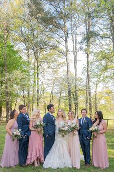 a bride and groom with their bridal party